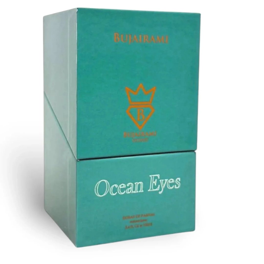 Bujairami Ocean Eyes by Bujairami 100ml Extrait — Teal two-tiered box packaging with gold crown logo and "Ocean Eyes" text