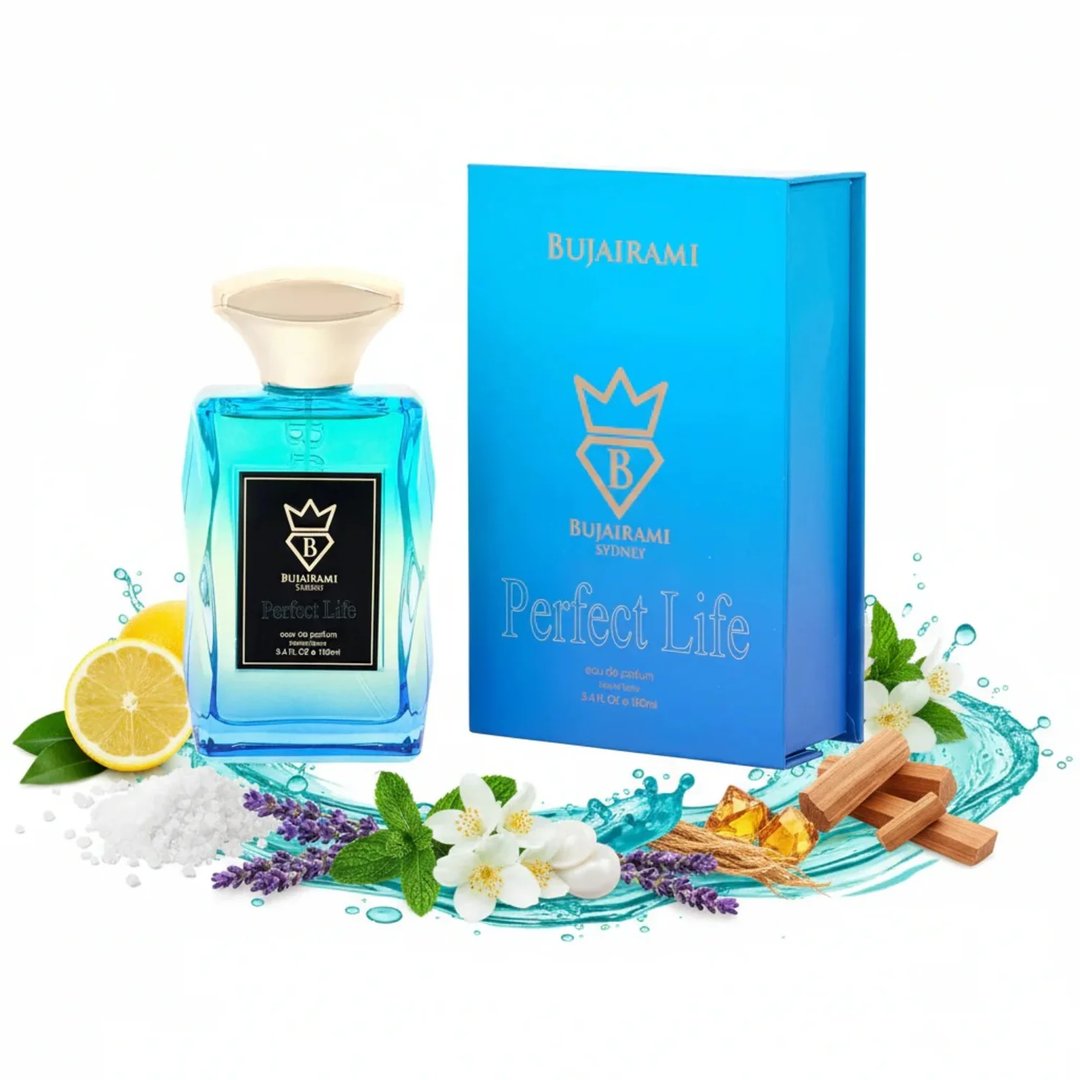 Bujairami Perfect Life Eau de Parfum — Blue glass bottle with gold cap, next to a blue box. Surrounded by lemon, lavender, mint, jasmine flowers, salt, and wood pieces.