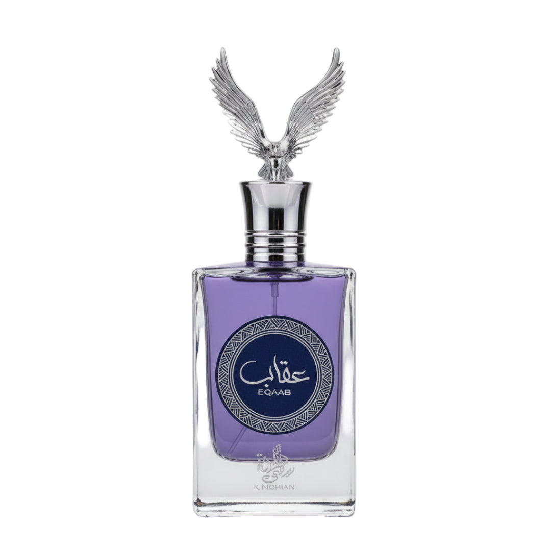 Al Wataniah Eqaab — Purple liquid in a clear glass bottle with a silver eagle topper and Arabic label.
