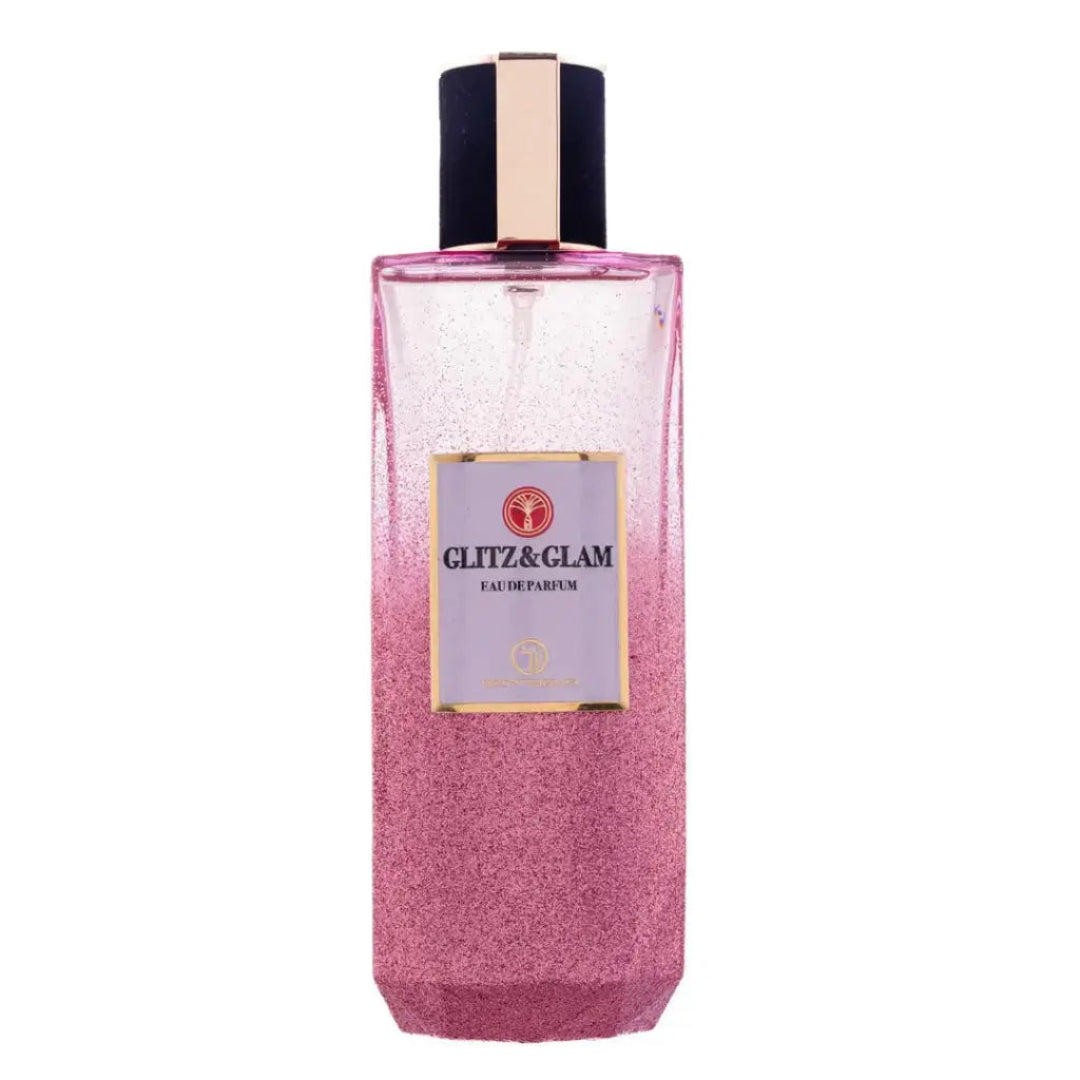 Grandeur Glitz Glam by Grandeur Elite 100 ml for Women — Square pink glitter perfume bottle with a gold and black cap, featuring a purple label with gold text.