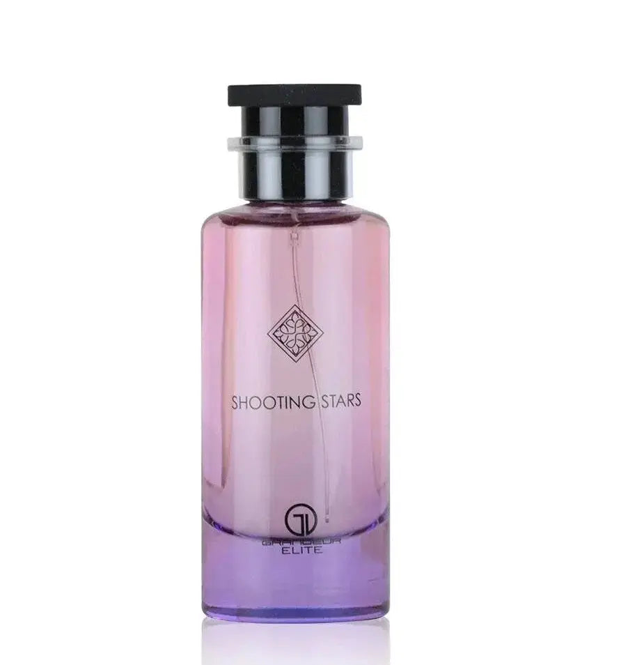 Grandeur Shooting Stars City by Grandeur Elite 100ml EDP — A gradient glass perfume bottle with pink and purple hues, featuring a black cap and a diamond-shaped emblem with the text "SHOOTING STARS" and "GRANDEUR ELITE" below.