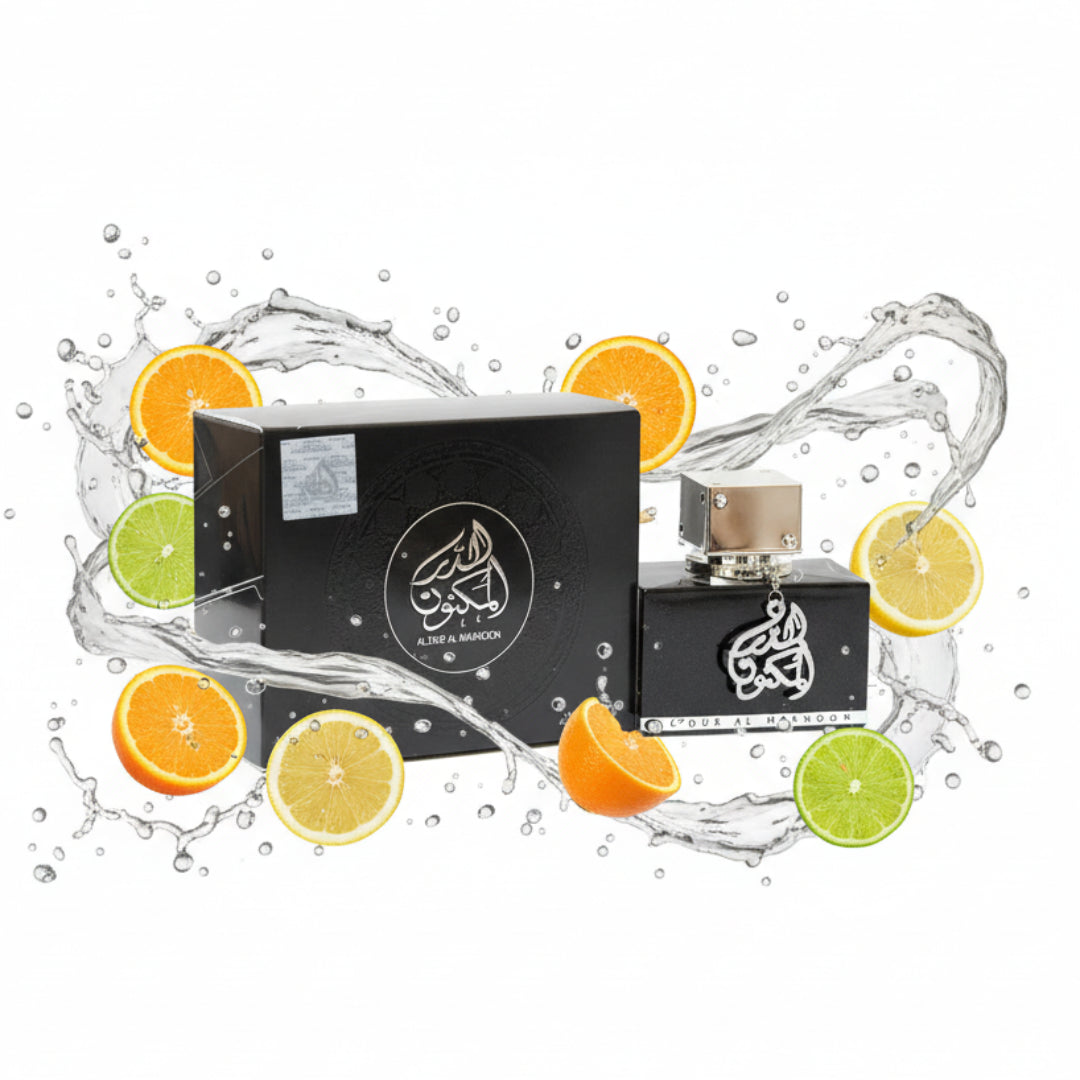 Lattafa Al Dur Al Maknoon Silver 100ml EDP Men — Black box and bottle surrounded by splashing water and citrus slices.