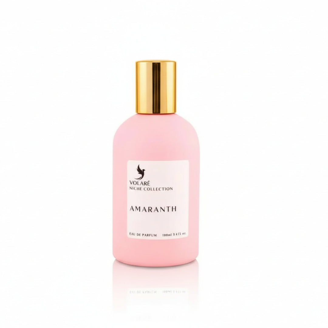 Volare Amaranth Niche by Volare – 100 ml for Her, a pink perfume bottle with a gold cap, featuring a white label with the Volare logo and product name.