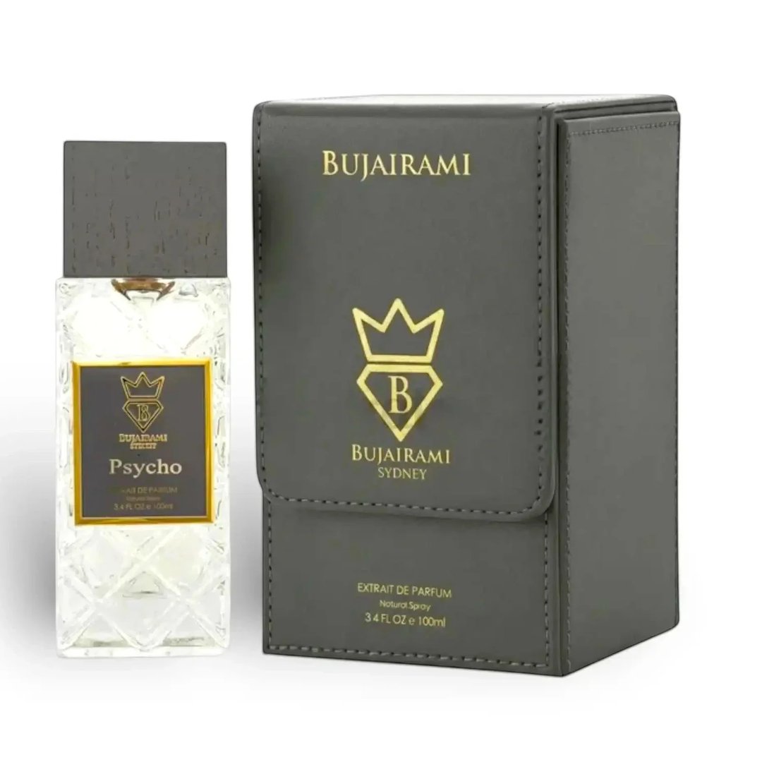 Bujairami Psycho by Bujairami 100ml Extrait — Clear glass perfume bottle with a grey textured cap and a gold label, next to a grey presentation box with gold branding.