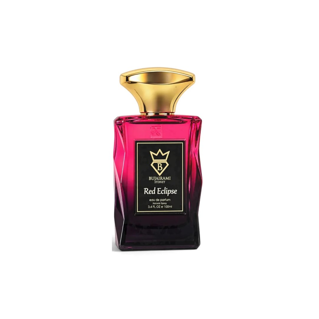 Bujairami Red Eclipse by Bujairami 100ml EDP — A faceted glass perfume bottle with a gradient from deep red to dark purple, topped with a shiny gold cap. The label features a black background with gold text and a crown logo.