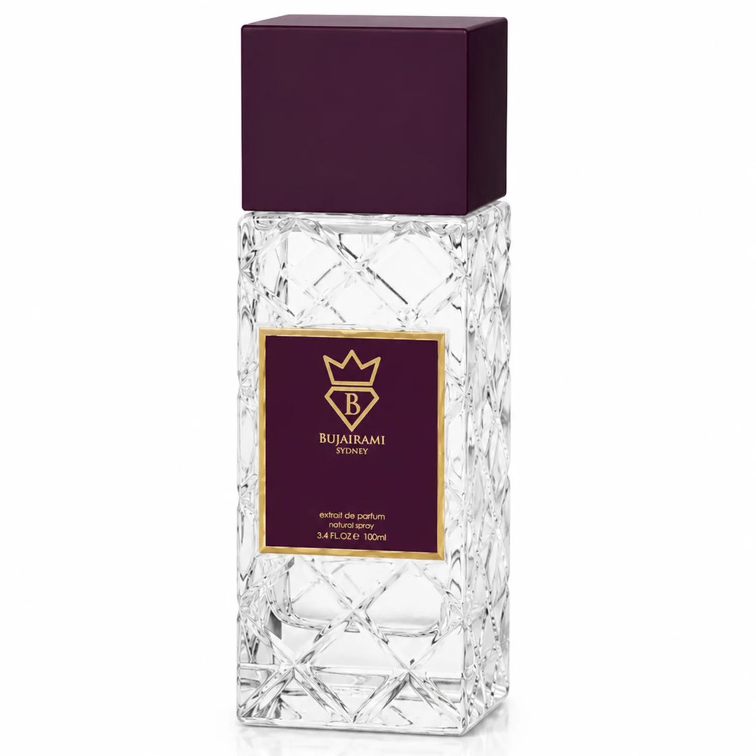 Bujairami Sacred Order by Bujairami 100ml Extrait — Clear faceted glass bottle with a deep purple square cap, featuring a gold-bordered maroon label with a crown logo and brand name.
