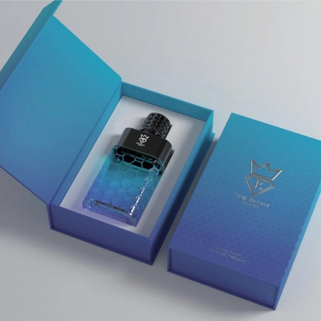 Bujairami Sovereign by Bujairami 100ml EDP — Perfume bottle with blue gradient and honeycomb pattern inside an open blue box with matching lid