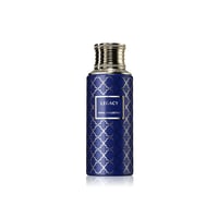 Maison Asrar Legacy by Maison Asrar 100ml EDP Unisex — Blue bottle with gold geometric pattern and ornate gold cap, centered on a white background with reflection.