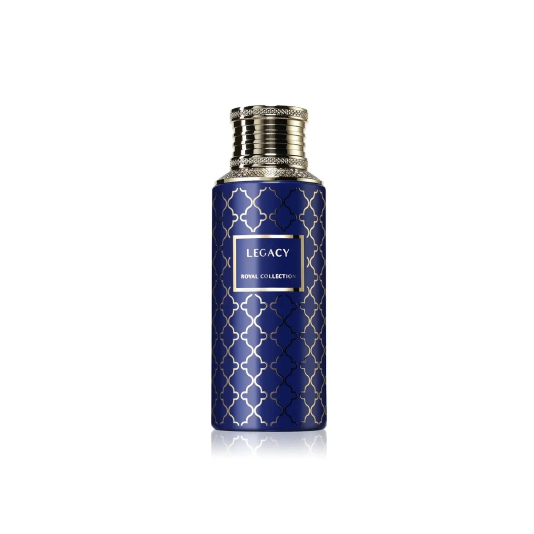 Maison Asrar Legacy by Maison Asrar 100ml EDP Unisex — Botol biru corak geometri emas dan penutup emas berhias, di tengah latar putih dengan pantulan.