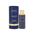 Maison Asrar Legacy by Maison Asrar 100ml EDP Unisex — Kotak silinder biru dengan aksen emas dan botol minyak wangi corak biru dan emas yang sepadan dengan penutup emas, dipaparkan di latar belakang putih.