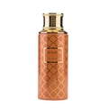 Maison Asrar Monarch by Maison Asrar 100ml EDP Unisex — Botol oren corak geometri emas dan penutup berlekuk emas, dengan label putih tertulis 'MONARCH' dan 'ROYAL COLLECTION'