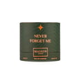 Maison Asrar Never Forget Me — Kotak silinder hijau bertekstur bergelombang dan lambang bintang emas, memaparkan teks 'NEVER FORGET ME', 'MAISON ASRAR', 'EAU DE PARFUM', '90 ML e', dan '3.04 FL OZ'.