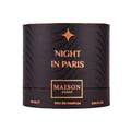 Maison Asrar Night In Paris — Kotak minyak wangi silinder hitam dengan garisan berombak emas dan bintang pecah emas. Teks tertulis 'NIGHT IN PARIS', 'MAISON ASRAR', '90 ML', 'EAU DE PARFUM', '3.04 FL. OZ.'
