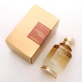 Khadlaj Ombre Notes by Khadlaj 100ml EDP Unisex — Golden box and amber-toned glass perfume bottle with gold cap, presented on a white background.