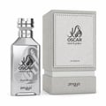 Zimaya Oscar Platinum EDP Unisex — Botol minyak wangi perak dengan penutup logam dan kotak kelabu bertekstur dengan rekaan dan tulisan timbul.
