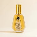 Ard Al Zaafaran Oud Mood by Ard Al Zaafaran 50ml EDP Unisex — Clear glass perfume bottle with a fluted design and a gold cap, filled with golden liquid. Label shows "Oud Mood" in English and Arabic script, with "e 50ml" and "MADE IN U.A.E."
