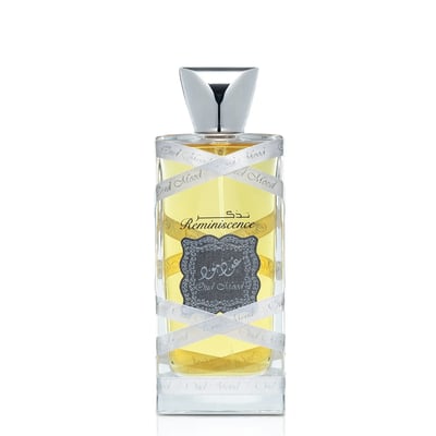 Lattafa Oud Mood Reminiscence Lattafa 100ml — A clear glass perfume bottle with yellow liquid, wrapped in a silver ribbon printed with 'Oud Mood'. The bottle has a silver cap and a dark grey label with Arabic script and 'Reminiscence' text. | Lattafa Oud Mood Reminiscence Lattafa 100ml — Botol kaca jernih berisi