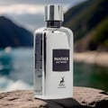 Maison Alhambra Panther Pour Homme — A sleek, mirrored silver perfume bottle with a black label reading "PANTHER pour homme" and a deer logo, placed on a rock with a blurred lake and mountain background. | Maison Alhambra Panther Pour Homme — Botol minyak wangi perak berkilat yang licin dengan label hitam bertulis
