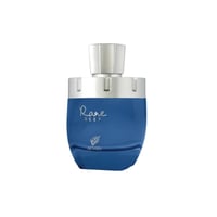 Afnan Rare Reef by Afnan 100ml Extrait de Parfum — Botol minyak wangi biru gelap berbentuk unik dengan penutup perak berkilat, tertulis 'Rare Reef' dan logo Afnan di bahagian hadapan.