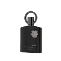 Afnan Supremacy Noir by Afnan 100ml EDP Men — Botol minyak wangi hitam legam dengan penutup bulat kelabu gelap dan lencana bulat kelabu di tengah.