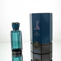 Afnan 9 AM by Afnan 100 ml EDP Unisex — Cream box with gold "9 am" logo next to a clear glass perfume bottle with gold cap