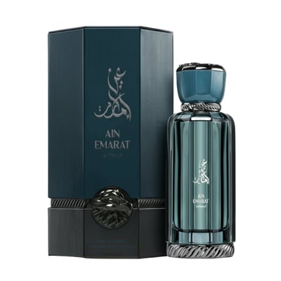 Al Wataniah Ain Emarat Eternal Extrait Perfume — Teal fluted bottle and matching box with Arabic calligraphy and lion emblem