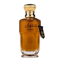 Al Wataniah Anwan Woody For Her 100ml EDP — Amber liquid in a clear glass bottle with a gold fluted cap and a black tag.