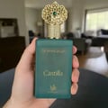 Afnan Rare Carbon by Afnan Perfumes – Dark glass bottle with silver cap, tilted in a black marble-patterned box.