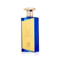 Afnan Turathi Brown – Amber glass perfume bottle with gold cap and Arabic script on a white background.