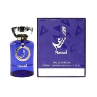 Al Wataniah Massad by Al Wataniah For Him 100ml Extract — Blue glass perfume bottle next to a purple box with geometric