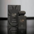 Afnan 9AM Dive by Afnan EDP 100 ml For Men — Blue glass bottle with gold cap on a dark blue display box, next to a matching