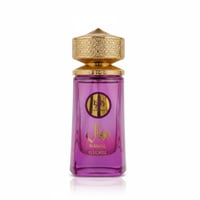 Al Wataniah Nawal Fluorite — Purple glass perfume bottle with ornate gold cap, Arabic script and "NAWAL FLUORITE" text