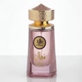 Ahmed Al Maghribi Rose Noir — Open cream box with floral pattern reveals a blush pink hexagonal perfume bottle with gold