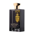 Al Wataniah Alexandrite Nawal — Dark glass perfume bottle with ornate gold cap and Arabic script label on white background