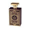 Al Wataniah Ain Emarat — Brown ribbed box with gold eagle emblem next to amber glass perfume bottle with gold accents