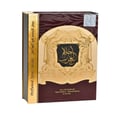 Al Wataniah House Of Oud — Dark glass perfume bottle with gold cap next to a dark, ornate book-style box.