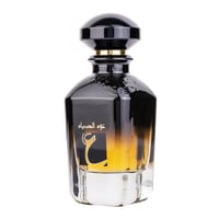 Ard Al Zaafaran Oud Al Sayad — Black and gold gradient glass perfume bottle with Arabic script and a black cap.