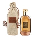 Ard Al Zaafaran Bint Hooran — Square glass perfume bottle with black faceted cap, gold accents, and a black ribbon bow.