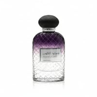 Ard Al Zaafaran Sayaad Al Quloob — Clear glass bottle with diamond pattern, purple gradient top, and black ribbed cap