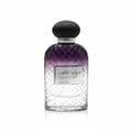Ard Al Zaafaran Jazzab Silver – Silver ornate cage bottle with green liquid, diamond-shaped emblem with Arabic script and