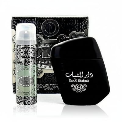Ard Al Zaafaran Dar Al Shabaab — Black fragrance bottle and spray can with ornate silver packaging