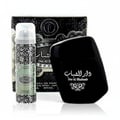 Al Wataniah Sabah Al Ward — Pink gradient glass perfume bottle with gold accents and black faceted cap, next to its matching