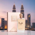 Al Wataniah Tibyan by Al Wataniah 100 ml EDP Women — Woman driving luxury car at night with city skyline background