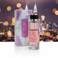 Al Wataniah Watani 100ml EDP – Ornate gold bottle with Arabic script and black cap, set against a blurred landscape