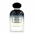 Ard Al Zaafaran Jazzab Silver – A metallic grey perfume bottle with a geometric lattice design and yellow liquid, angled on