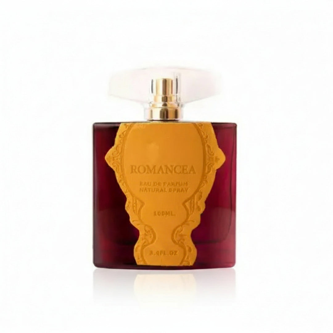 Ard Al Zaafaran Heibah — Rectangular glass perfume bottle with peach liquid, gold cap, pink ribbon, and Arabic script.