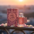 Ard Al Zaafaran Hooria — Perfume bottle and box on car dashboard with Petronas Towers at sunset