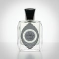 Ard Al Zaafaran Maraseem — Perfume bottle and box displayed against a night cityscape with illuminated fountains.