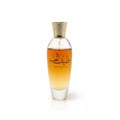 Ard Al Zaafaran Midnight Oud — Dark blue glass perfume bottle with a gold crown-like cap and gold label.