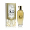 Ard Al Zaafaran Midnight Oud — Dark blue perfume bottle with gold crown cap and ornate gold label, next to a patterned box.